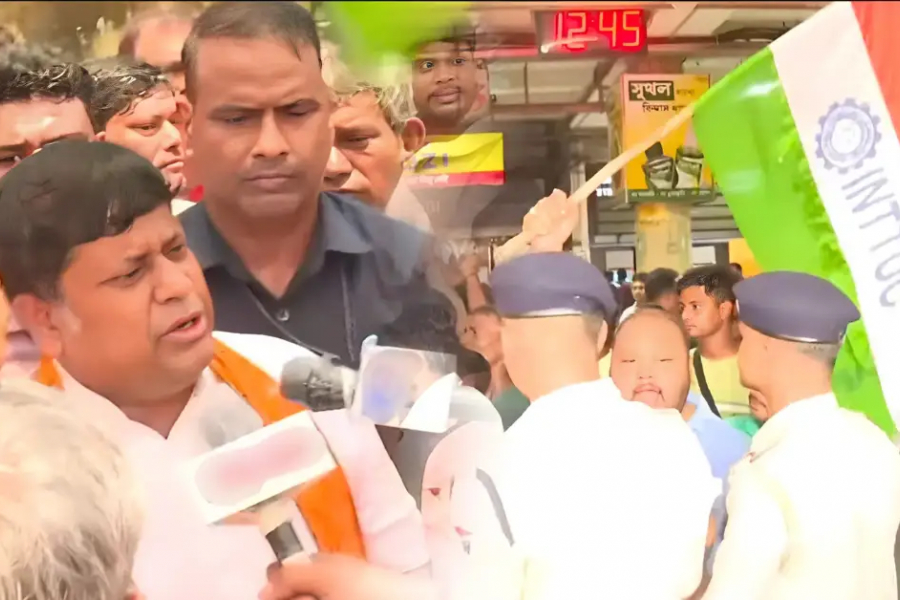 Trinamool workers protest around Sukant as he lands in Dum Dum after inaugurating AC local